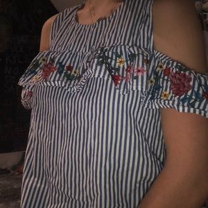 Blue & white stripe shirt with floral embroidery.